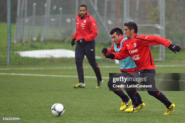 Jean Beausejour , Gary Medel and Osvaldo Gonzalez of Chile during a training at Spiserwies stadium November 13, 2012 in Sait Gallen, Switzerland....