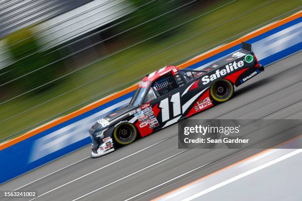 Corey Heim, driver of the Safelite Toyota, drives during the NASCAR Craftsman Truck Series CRC Brakleen 150 at Pocono Raceway on July 22, 2023 in...