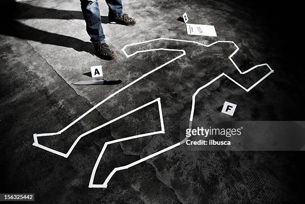 murderer back on the crime scene - detective stock pictures, royalty-free photos & images