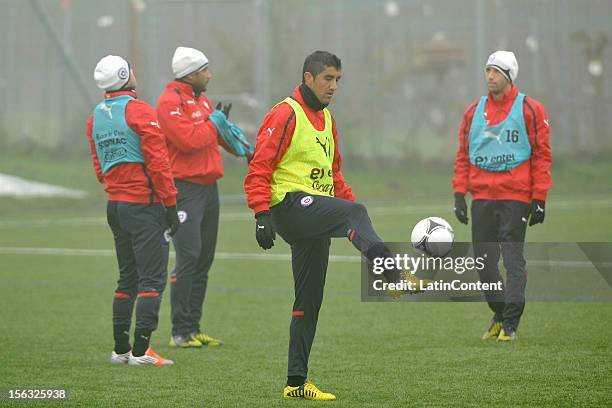 Osvaldo Gonzalez plays with the ball during a training at Spiserwies stadium November 13, 2012 in Sait Gallen, Switzerland. Chile will play a...