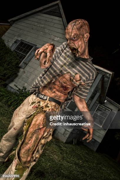 pictures of real classic zombie outside an old farmhouse - psychotic stock pictures, royalty-free photos & images