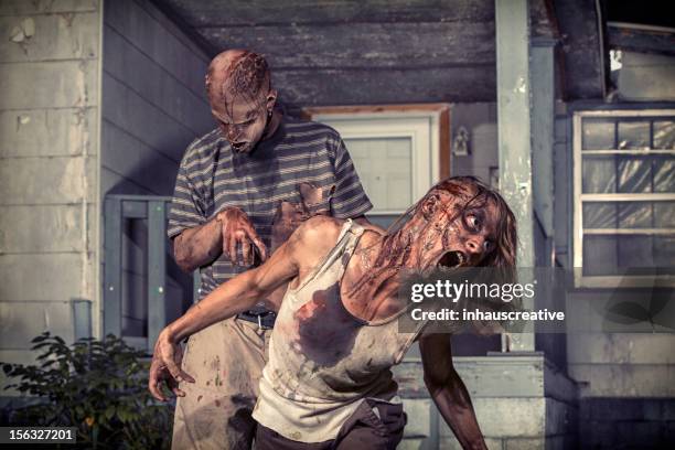 pictures of real classic zombies outside an old farmhouse - psychotic stock pictures, royalty-free photos & images