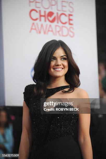 Lucy Hale arrives for the 2012 People's Choice Awards at the Nokia Theatre in Los Angeles, California, January 11, 2012. AFP PHOTO / Robyn Beck