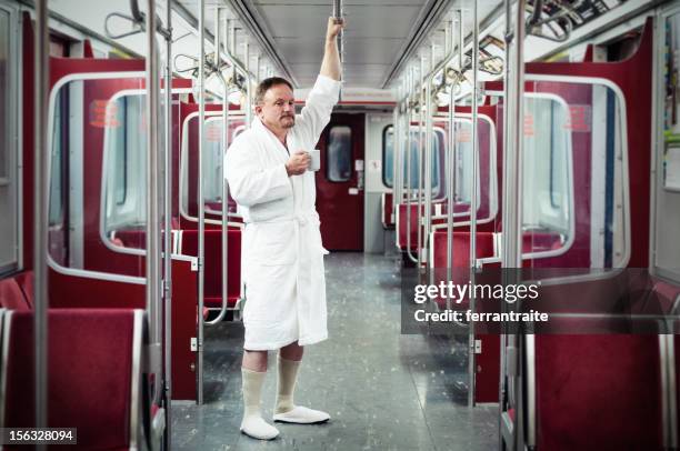 early commuter on the train - men in white socks 個照片及圖片檔