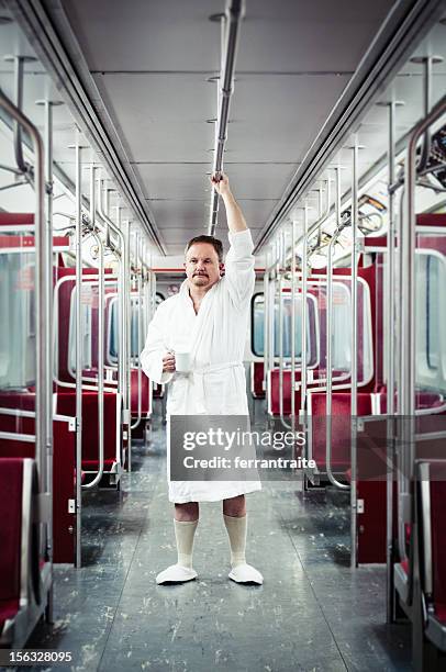 early commuter on the train - funny slipper stock pictures, royalty-free photos & images