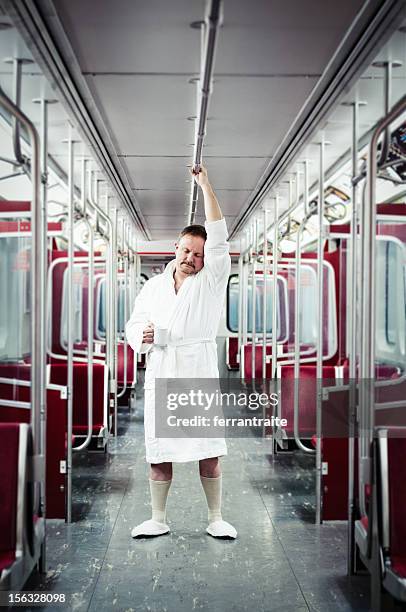 early commuter on the subway - funny slipper stock pictures, royalty-free photos & images