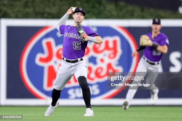 Randal Grichuk of the Colorado Rockies throws the ball against the Miami Marlins during the fifth inning at loanDepot park on July 22, 2023 in Miami,...