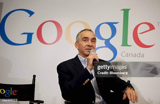 Patrick Pichette, chief financial officer of Google Inc., speaks to the press during a media tour for the grand opening of Google Inc.'s new office...