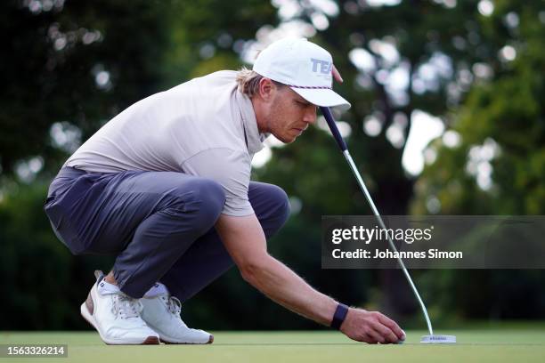 Max Rottluff of Germany tries to line up a putt on the putting green hole during Day Three of the Big Green Egg German Challenge powered by VcG at...