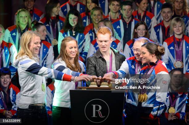 Anna Watkins, Helen Glover, Greg Rutherford, Barney Storey and Sarah Storey switch on the Regent Street Christmas Lights at Regent Street on November...