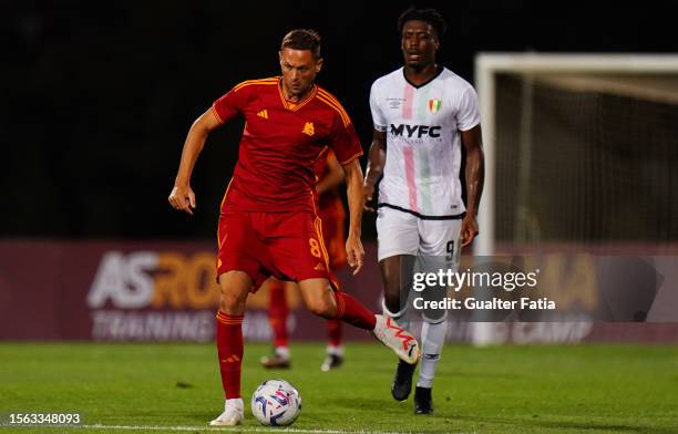 Nemanja Matic of AS Roma with Kialonda Gaspar of CF Estrela da Amadora in action during the Pre-Season Friendly match between AS Roma and CF Estrela...