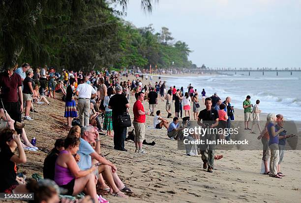 Spectators line the beach to view the total solar eclipse on November 14, 2012 in Palm Cove, Australia. Thousands of eclipse-watchers have gathered...