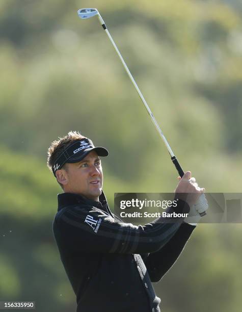 Ian Poulter of England hits an approach shot during the Pro-Am Day ahead of the 2012 Australian Masters at Kingston Heath Golf Club on November 14,...