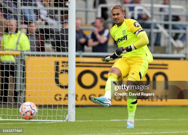 Alphonse Areola of West Ham United passes the ball during the pre-season friendly match between Dagenham & Redbridge and West Ham United at Chigwell...