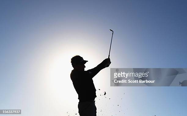 Ian Poulter of England hits an approach shot during the Pro-Am Day ahead of the 2012 Australian Masters at Kingston Heath Golf Club on November 14,...