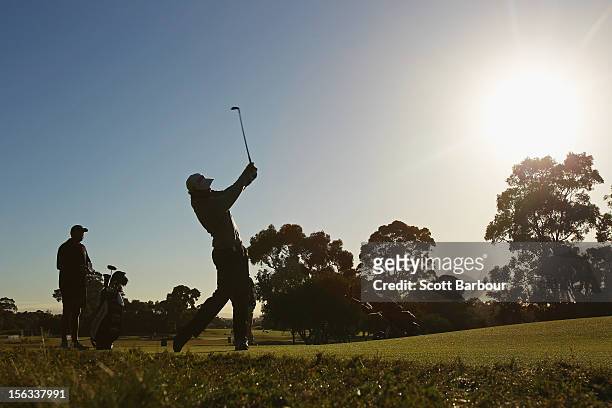 Adam Scott of Australia hits an approach shot during the Pro-Am Day ahead of the 2012 Australian Masters at Kingston Heath Golf Club on November 14,...