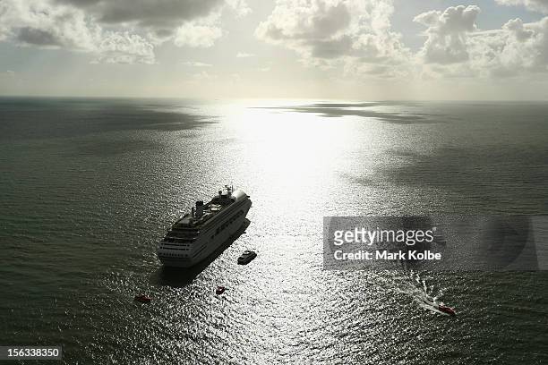 Cruise ship is seen in place off Port Douglas for passengers to watch the total eclipse on November 14, 2012 in Cairns, Australia. Thousands of...