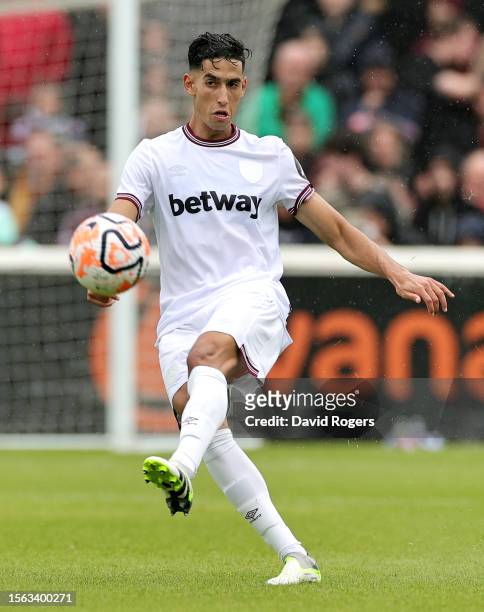 Nayef Aguerd of West Ham United passes the ball during the pre-season friendly match between Dagenham & Redbridge and West Ham United at Chigwell...