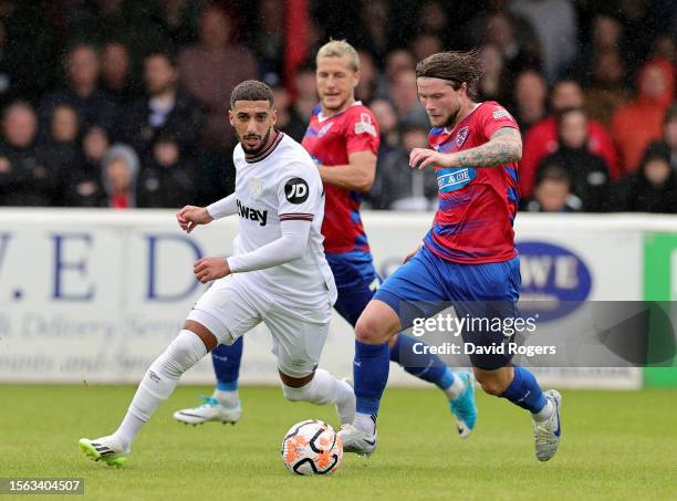 Said Benrahma of West Ham United moves away from Elliot Johnson during the pre-season friendly match between Dagenham & Redbridge and West Ham United...