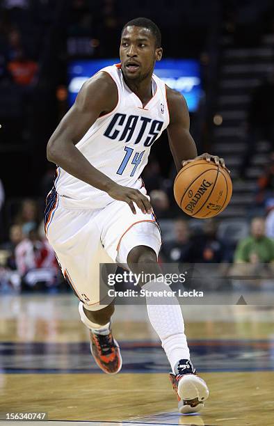 Michael Kidd-Gilchrist of the Charlotte Bobcats drives to the basket against the Washington Wizards during their game at Time Warner Cable Arena on...