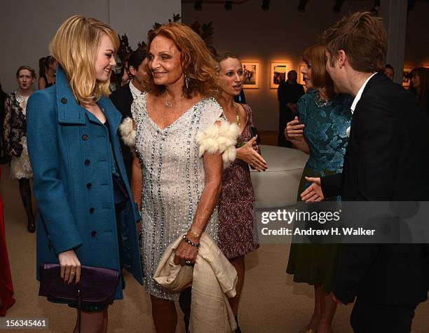 Actress Emma Stone, designer Diane Von Furstenberg, Vogue Editor -in-Chief Anna Wintour and Burberry CCO Christopher Bailey attend The Ninth Annual...