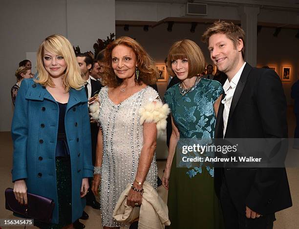Actress Emma Stone, designer Diane Von Furstenberg, Vogue Editor -in-Chief Anna Wintour and Burberry CCO Christopher Bailey attend The Ninth Annual...
