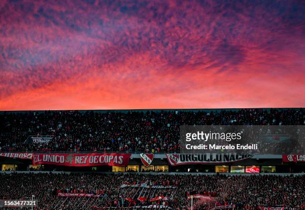 Fans of Independiente cheer for their team during the match between Independiente and Boca Juniors as part of Liga Profesional 2023 at Estadio...