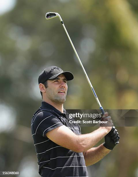 Rugby League player Cameron Smith hits an approach shot during the Pro-Am Day ahead of the 2012 Australian Masters at Kingston Heath Golf Club on...