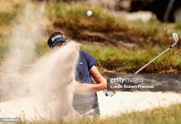 Robert Allenby of Australia plays a shot out of the bunker ahead of the 2012 Australian Masters at Kingston Heath Golf Club on November 14, 2012 in...