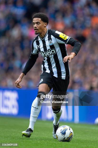 Jamal Lewis of Newcastle United in action during the pre-season friendly match between Rangers and Newcastle at Ibrox Stadium on July 18, 2023 in...