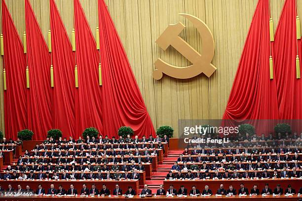 China's leaders gather during the closing session of the 18th National Congress of the Communist Party of China inside the Great Hall of the People...