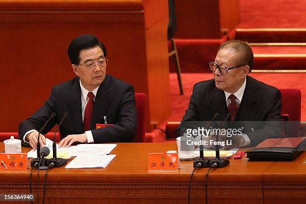 China's President Hu Jintao and former President Jiang Zemin attend the closing session of the 18th National Congress of the Communist Party of China...