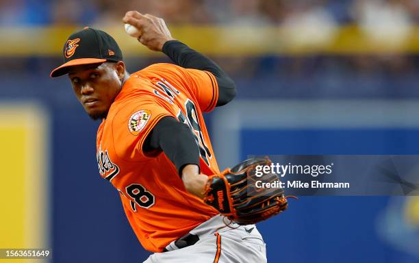 Yennier Cano of the Baltimore Orioles pitches in the seventh inning during a game `ax at Tropicana Field on July 22, 2023 in St Petersburg, Florida.