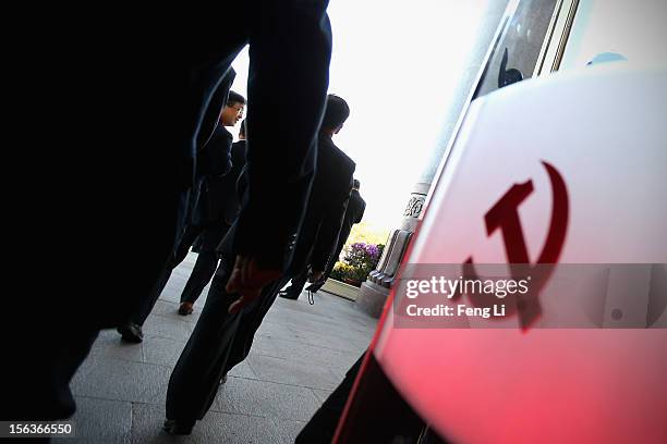 Delegates leaves after the closing session of the 18th National Congress of the Communist Party of China inside the Great Hall of the People on...