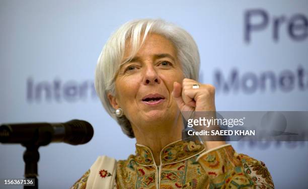 International Monetary Fund Managing Director Christine Lagarde smiles during a joint press conference along with Malaysian Central Bank Governor...