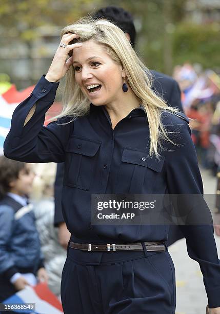 The Netherlands' Princess Maxima arrives at the Princess Amalia School in Zoetermeer, on November 14, 2012. The princess visits the school during the...