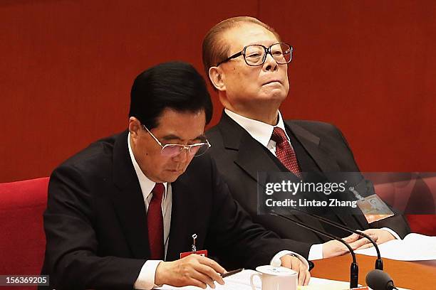 Chinese President Hu Jintao and former president Jiang Zemin attend closing of the 18th Communist Party Congress at the Great Hall of the People on...