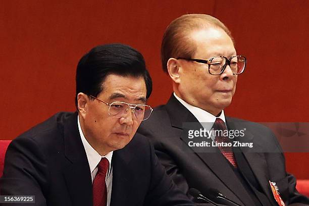 Chinese President Hu Jintao and former president Jiang Zemin attend closing of the 18th Communist Party Congress at the Great Hall of the People on...
