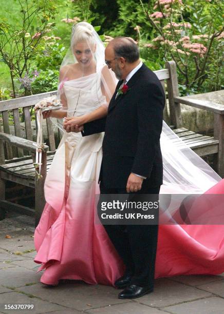 Gwen Stefani with her father Dennis Stefani during the wedding ceremony of Gwen Stefani and Gavin Rossdale held on September 14, 2002 at St Paul's...