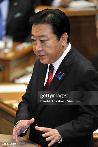 Japanese Prime Minister and ruling Democratic Party of Japan leader Yoshihiko Noda speaks during the one on one debate with the Liberal Democratic...