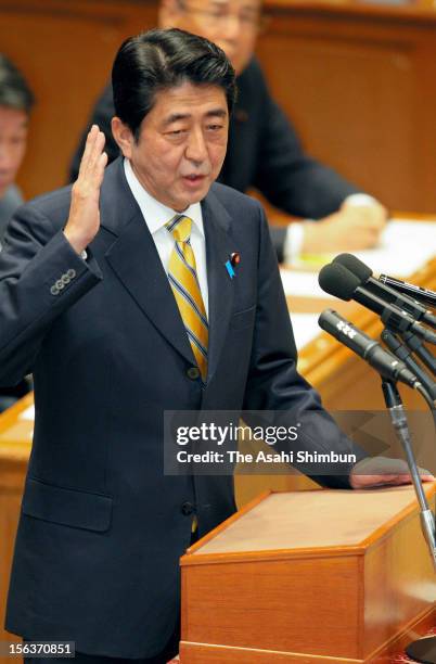 Opposition Liberal Democratic Party leader Shinzo Abe speaks during the one on one debate with Japanese Prime Minister and ruling Democratic Party of...