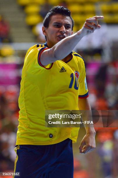 Angellott Caro of Colombia celebrates after scoring his teams second goal during the FIFA Futsal World Cup Quarter-Final match between Colombia and...