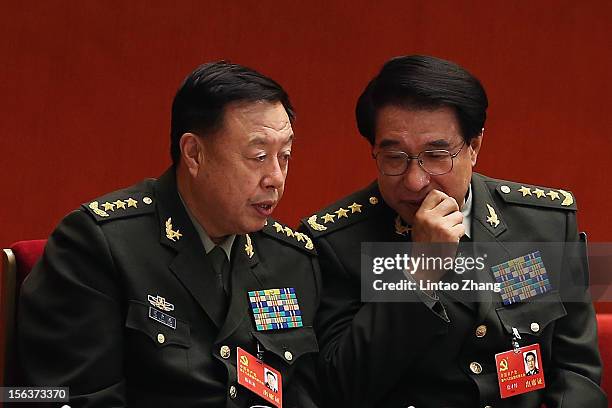 Chinese vice chairman of the Central Military Commission Fan Changlong and Xu Caihou, vice chairman of the Central Military Commission talk during...