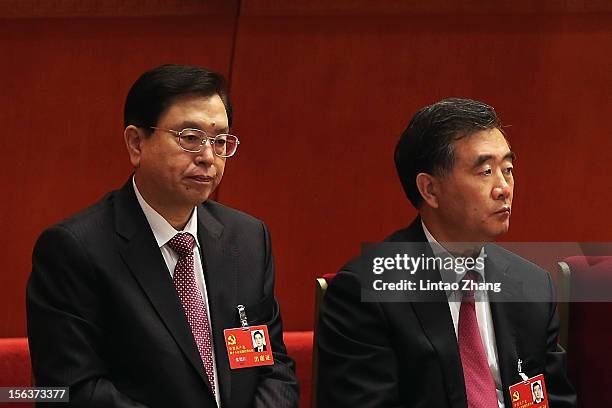 Zhang Dejiang, vice premier of China and Wang Yang, Chinese Communist Party secretary of Guangdong Province attends the closing session of the 18th...