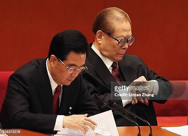 Chinese President Hu Jintao and former president Jiang Zemin attend closing of the 18th Communist Party Congress at the Great Hall of the People on...