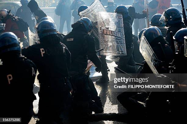 Riot policemen fight with demonstrators during a protest on a day of mobilisation against austerity measures by workers in southern Europe on...