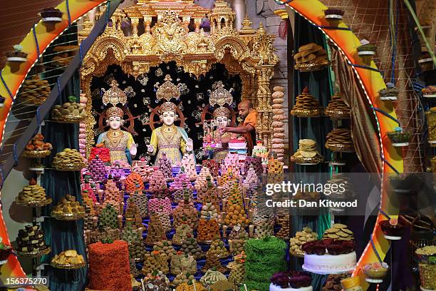 Religious motif is placed on a stand as Sadhus and Hindus celebrate Diwali at the BAPS Shri Swaminarayan Mandir on November 14, 2012 in London,...