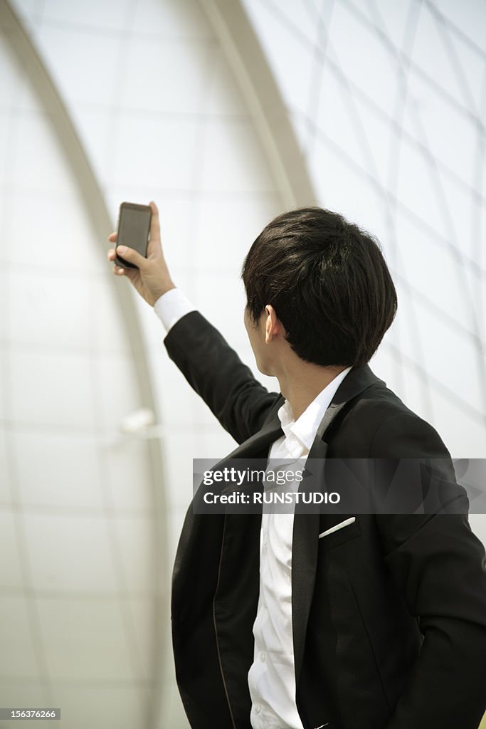 Businessman using mobile phone