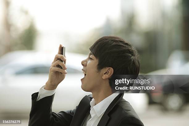 On Phone Rushing Yelling At Cell Phone Photos and Premium High Res Pictures - Getty Images