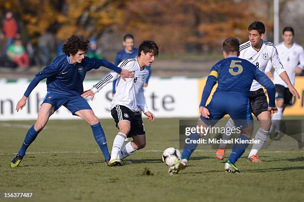 Adrien Rabiot of France challenges Fabian Schnellhardt during the International Friendly match between U19 Germany and U19 France at Rheinstadium on...